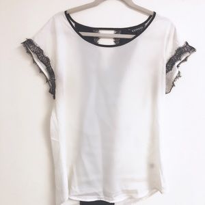 Black and white silk blouse